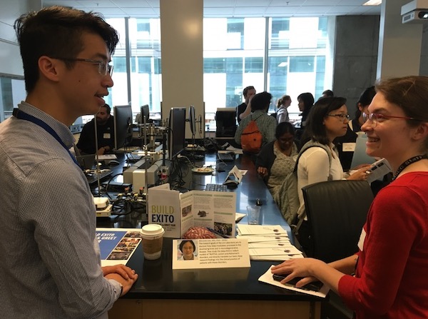 Undergraduate researchers discuss sleep science at an outreach event